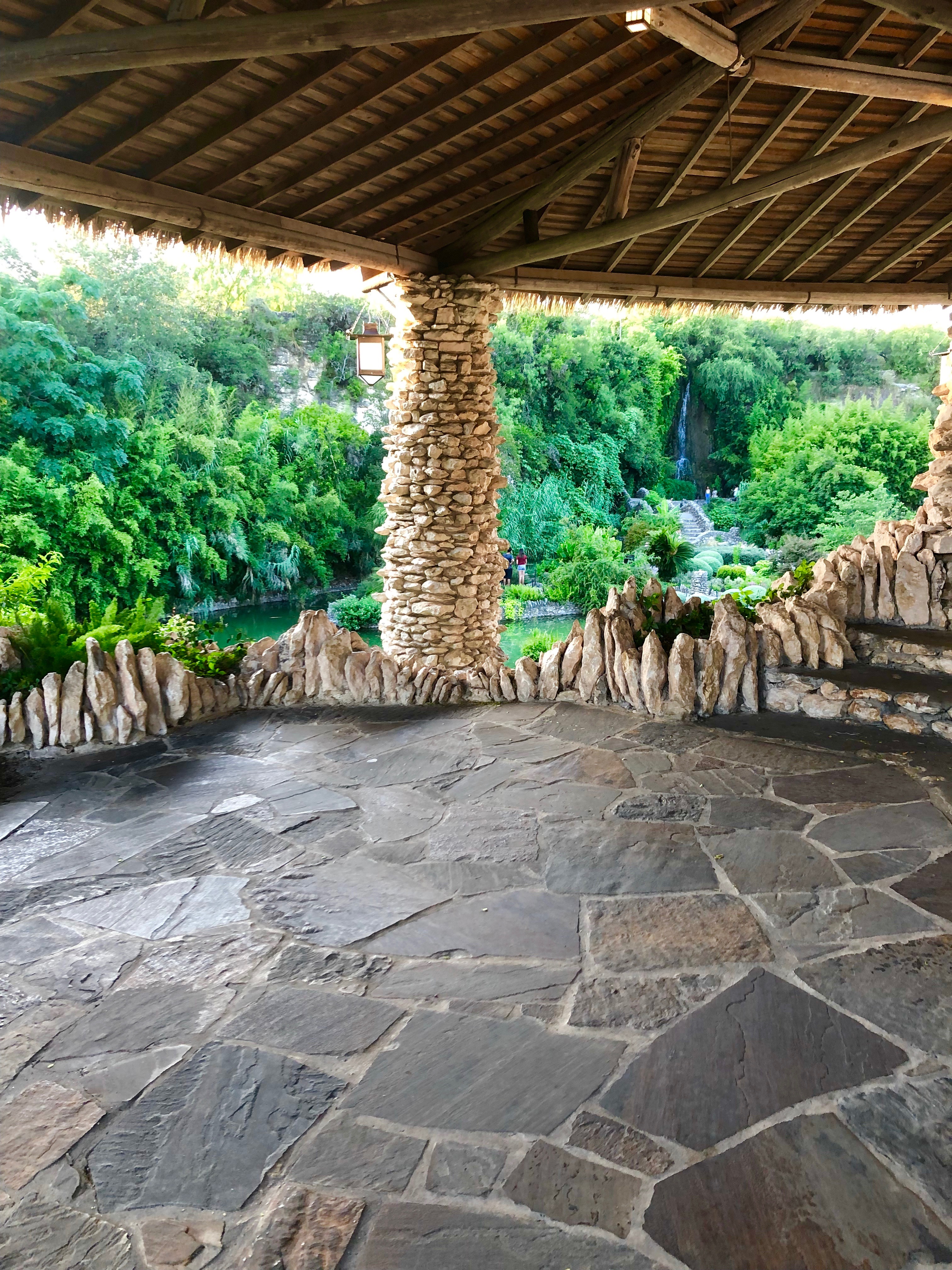 Lush gardens can be seen from the limestone pavilion.